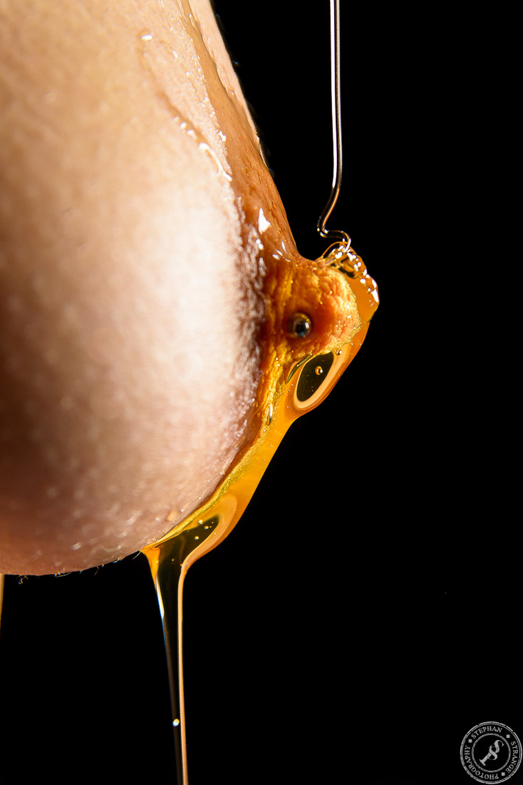 Sweet Honey dropping down from a female nipple