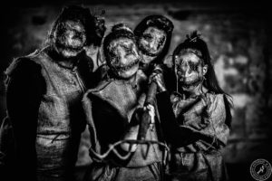 Horror mask shooting with a group of Voodoo Dolls cosplayer