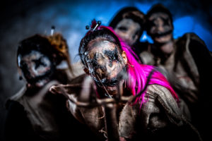 Horror mask shooting with a group of Voodoo Dolls cosplayer
