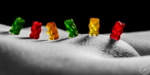 Sexy nude colorkey shooting with a gummi bear gang