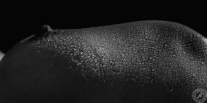 Water Drops on a nude girls pure skin.